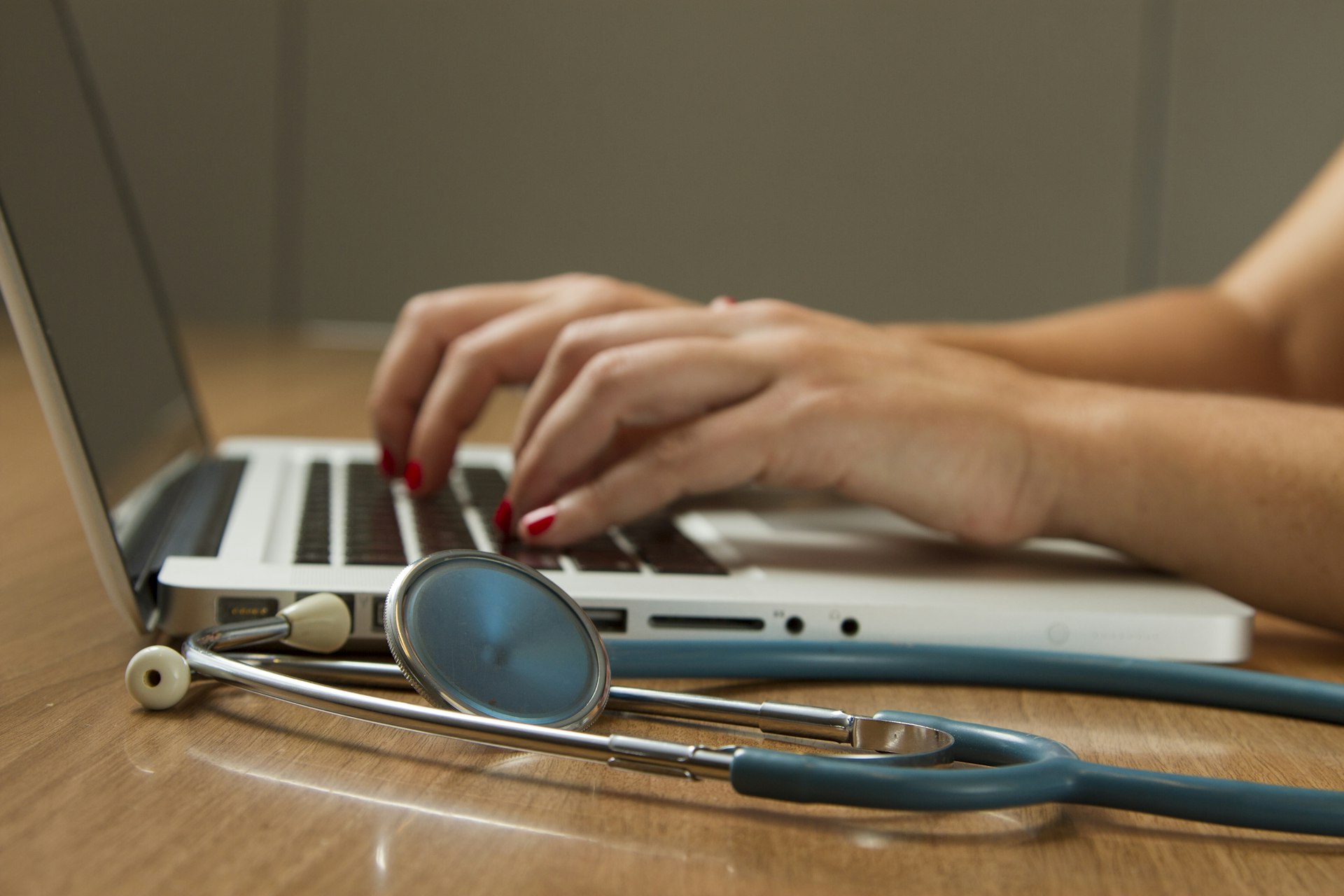 Healthcare professional supporting a patient during rehabilitation